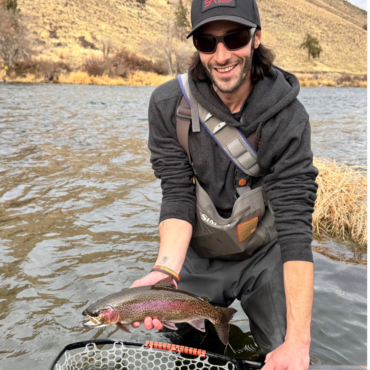 Angler Holding Deschutes River Rainbow Trout