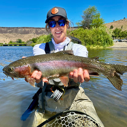 Angler Holding Deschutes River Rainbow Trout During Salmonfly Hatch