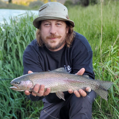 Angler Holding Deschutes River Rainbow Trout During Salmonfly Hatch