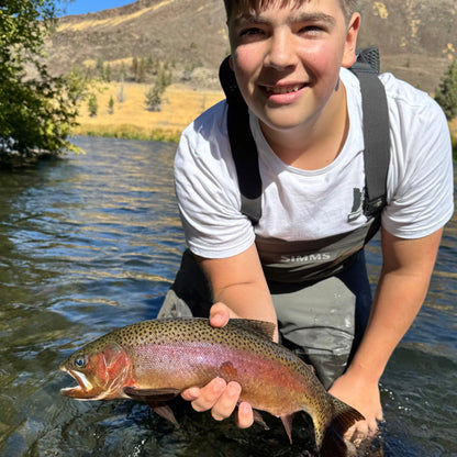 Angler Holding Deschutes River Rainbow Trout During Salmonfly Hatch