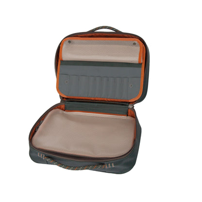 Interior view of the Fishpond Backwater Fly Tying Kit with compartments and mesh pockets open