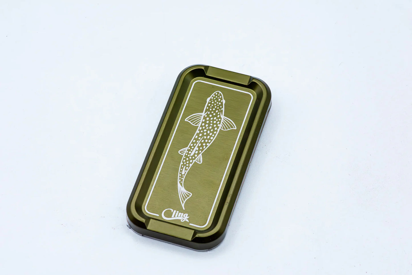 Cling Mag Grab Double Stack in deep olive green with engraved trout design and anodized aluminum finish.
