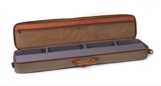 Interior view of the Fishpond Dakota Rod and Reel Case showing padded compartments and mesh storage pockets