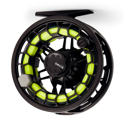 Black Orvis Ratio fly reel front view with bright green fly line spooled