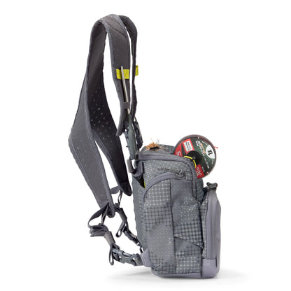side view of the Orvis Chest Pack showing fly fishing accessories and gear compartments