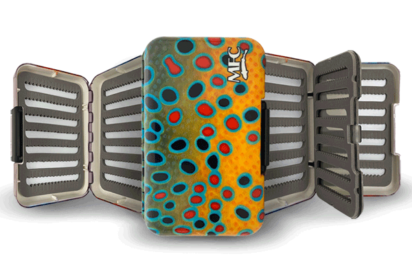 Montana Fly Company Polly Fly Box opened to show multiple swing-leaf panels and slotted foam for fly storage.