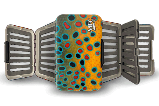 Montana Fly Company Polly Fly Box opened to show multiple swing-leaf panels and slotted foam for fly storage.