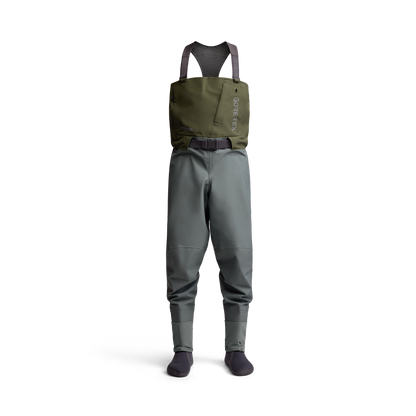 Full view of the Sitka Crosscurrent GTX Stockingfoot Wader standing upright with belt and shoulder straps visible.