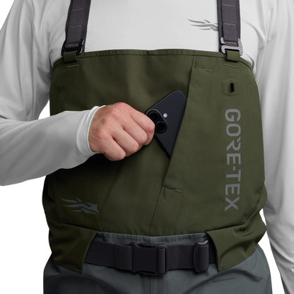 Close-up of the chest pocket on the Sitka Crosscurrent GTX Stockingfoot Wader with a phone being stored.